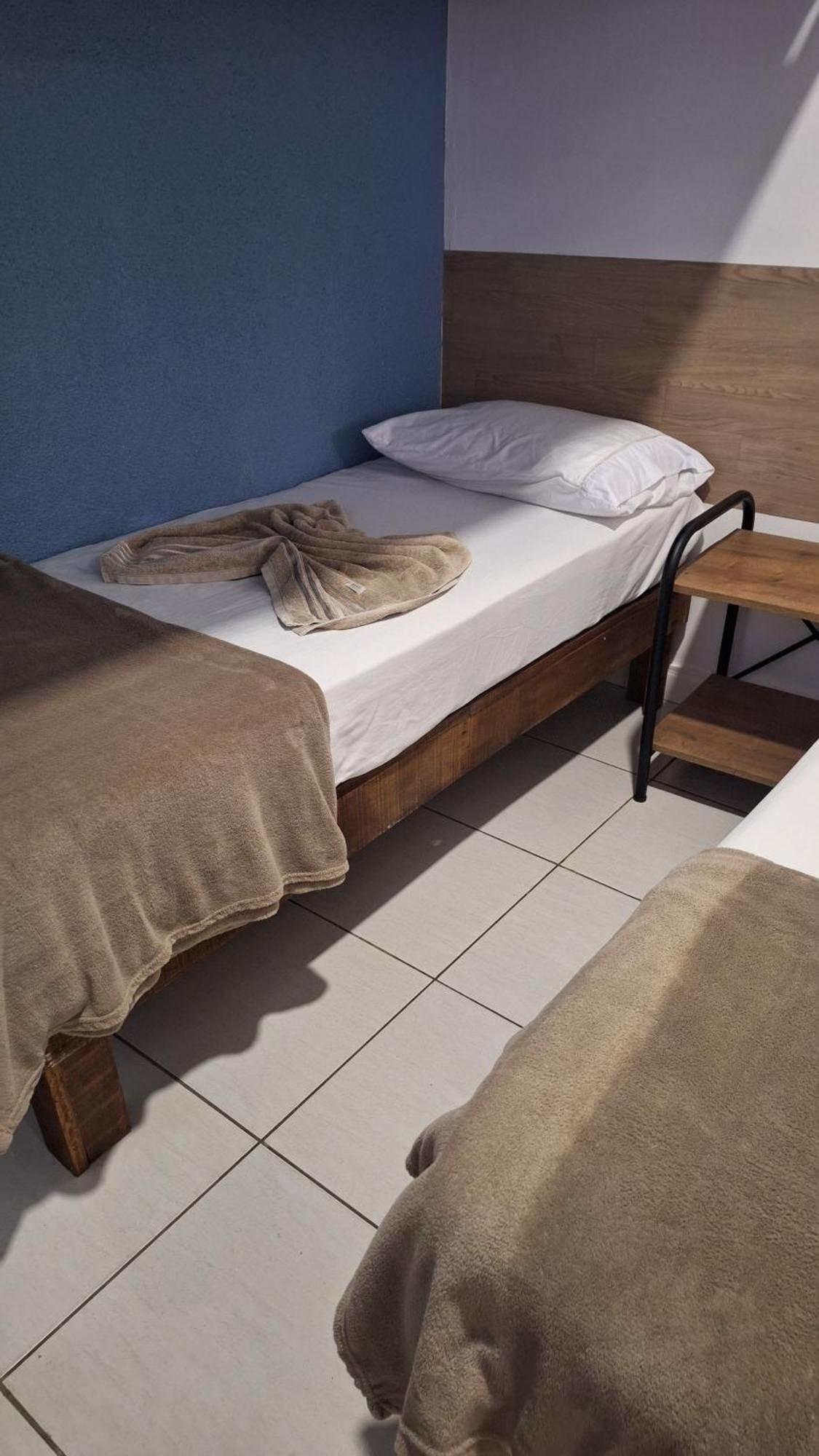 Camisa 10 Guest house *